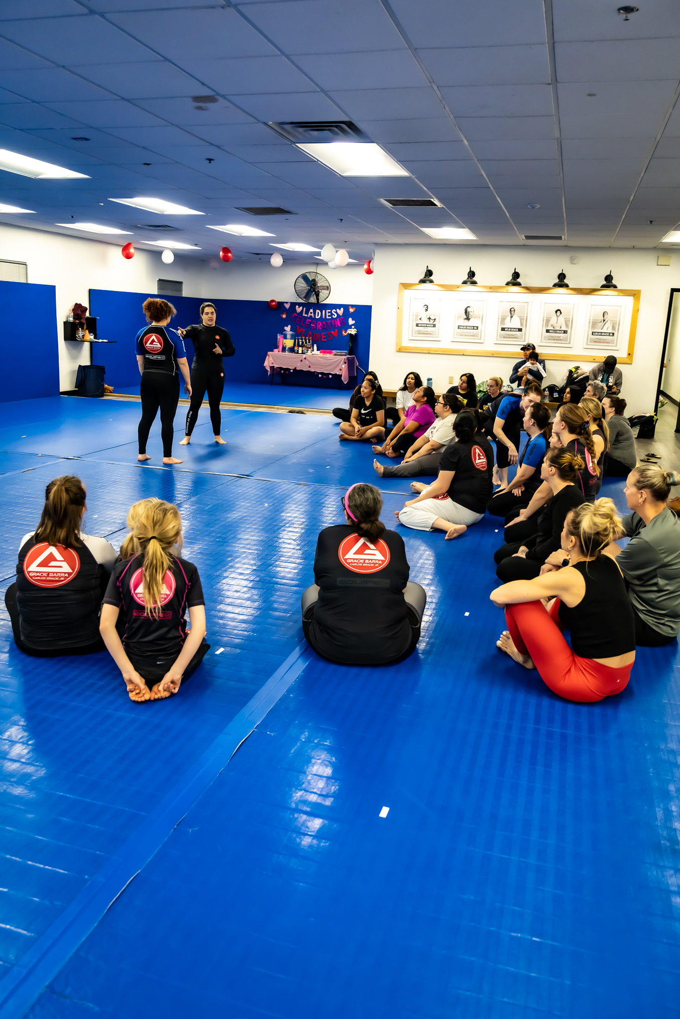 Moms fighting in jiu-jitsu class
